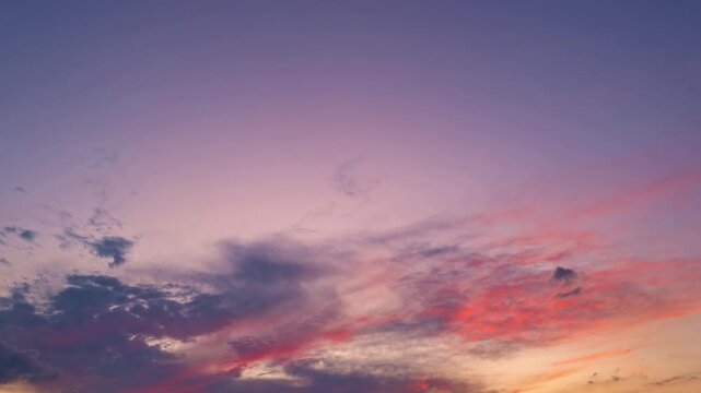 Twilight Sky timelapse. Moving clouds and sunset. Clouds float through the evening. Dusk twilight sky time lapse. Dramatic skies are moving. Cumulus and cirrus on storm. Sunrise cloudscape.
