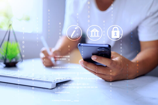 The data privacy concept with a man using a smartphone for personal business, represents the need for data and search history to remain confidential and private.