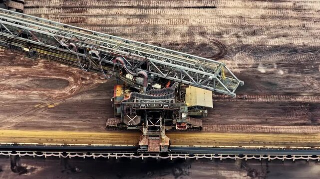 Aerial view of the massive bucket-wheel excavator operating at the Garzweiler surface mine in Juchen, North Rhine-Westphalia, Germany.
