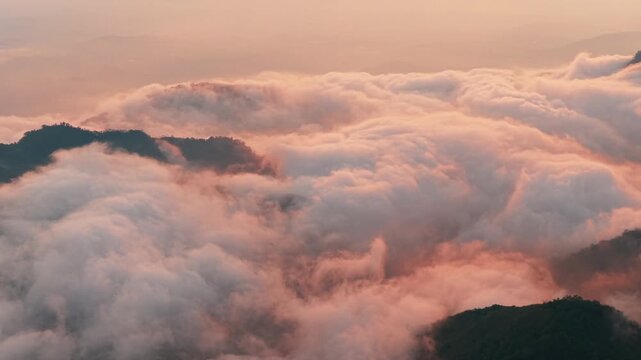 Beautiful sunset in the mountains. Landscape with mountain valley, colorful and clouds. Aerial view