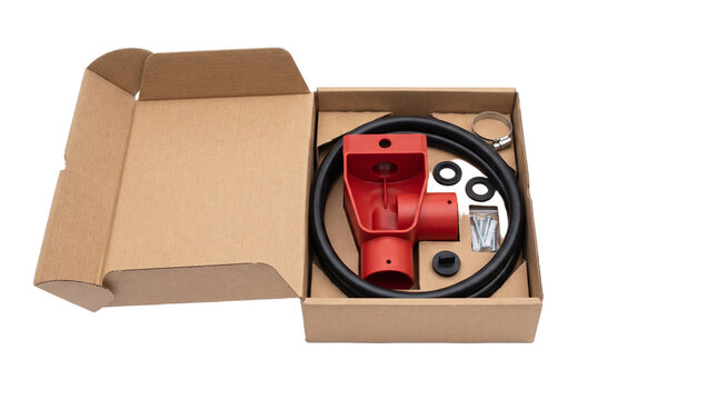 Red plastic plumbing fitting kit with hose and screws in cardboard box PNG Isolated on transparent background