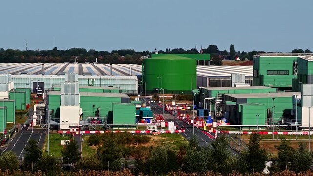 Aerial view of the Agriport A7 Microsoft Hyperscale Data Center Campus featuring industrial green buildings and infrastructure in Middenmeer, Noord-Holland, Netherlands.