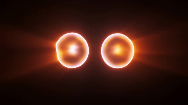 分裂と結合を繰り返す光る有機的な形状