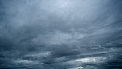 Obraz premium Dark sky with stormy clouds. Dramatic sky rain,Dark clouds before a thunder-storm,clouds before rain