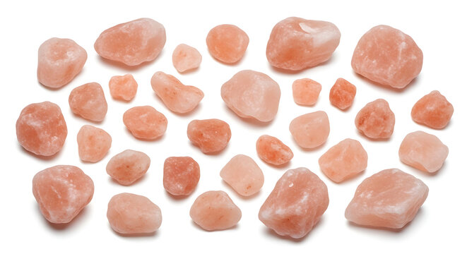 Scattered round coral beads on neutral background