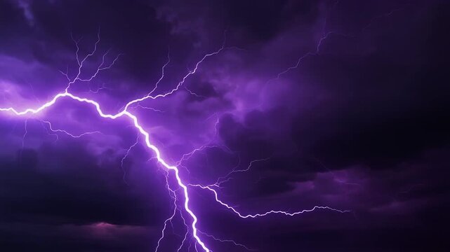Vibrant purple lightning bolt flashing across a dark stormy night sky with dramatic thunderclouds