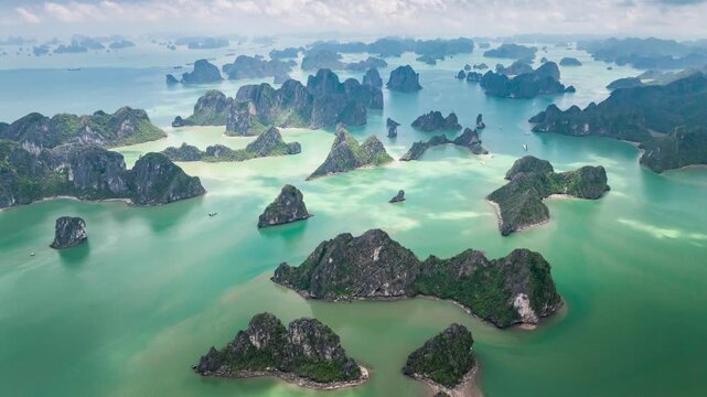 timelapsed aerial view of the natural scenery of the karst peaks and forests in Ha Long Bay, Vietnam