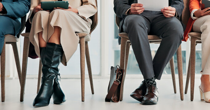 Job interview, legs and hands with tech in waiting room, online or research for recruitment process. Business, vacancy and people with paperwork, onboarding and plan for hiring assessment with info