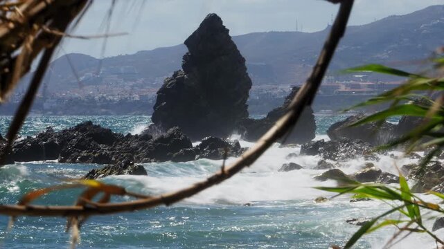 Timelapse of rocky beach in Nerja, Andalusia, Spain