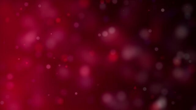 Soft bokeh lights glow and shimmer against a dark red gradient background, creating an abstract and festive atmosphere.