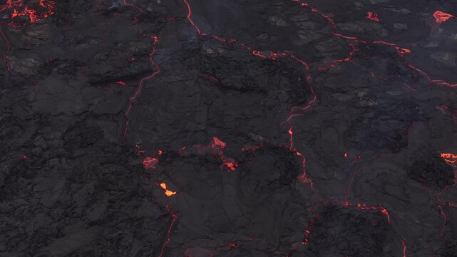 Aerial view of glowing red magma flowing through dark solidified lava fields in Reykjavik, Reykjavikurborg, Iceland.