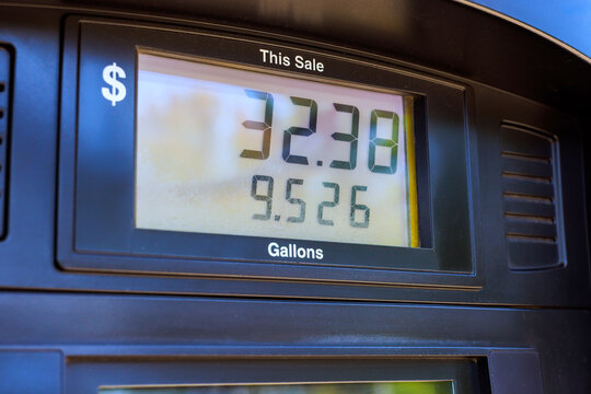 Fuel pump sale amount gallons during refueling session at as station.