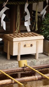 Traditional Japanese Shinto Shrine Offering Box and Temizuya Water Basin