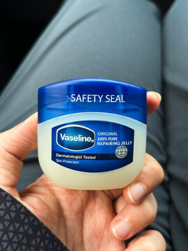 Kuala Lumpur, Malaysia- September 2026: Buying Vaseline original due to dried skin texture cause by eczema