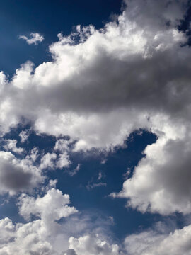 Massive Towering Cumulus Clouds in Dramatic Summer Sky