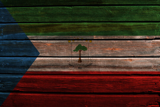 3D Flag of Equatorial Guinea on a old wood wall background.
