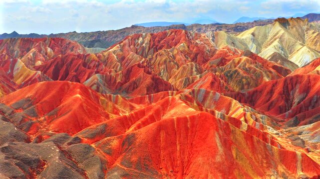 Aerial drone view of Zhangye Rainbow Mountains, vibrant multicolored Danxia landform in Gansu China
Drone shot of spectacular layered rainbow mountains, Zhangye Colorful Danxia geopark landscape