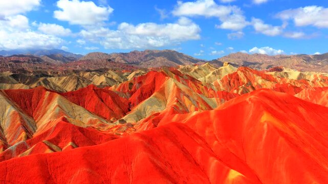 Aerial drone view of Zhangye Rainbow Mountains, vibrant multicolored Danxia landform in Gansu China
Drone shot of spectacular layered rainbow mountains, Zhangye Colorful Danxia geopark landscape