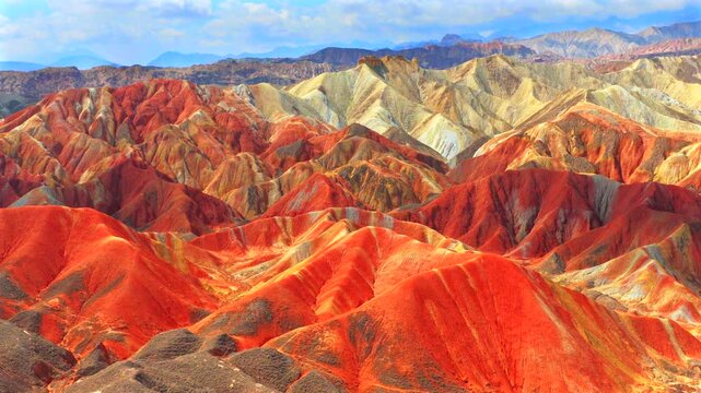 Aerial drone view of Zhangye Rainbow Mountains, vibrant multicolored Danxia landform in Gansu China
Drone shot of spectacular layered rainbow mountains, Zhangye Colorful Danxia geopark landscape