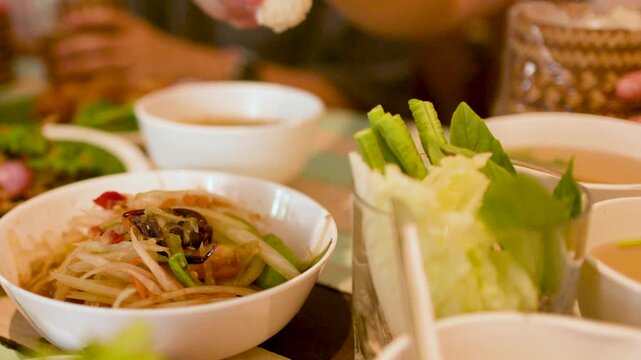 Traditional Thai Papaya Salad and Sticky Rice at Bangkok Restaurant