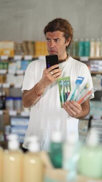 European scans the barcode on the packaging of toothbrushes on a mobile and pays using an online application on a mobile phone. Buyer in a pharmacy pays for purchases by QR . High quality 4k footage
