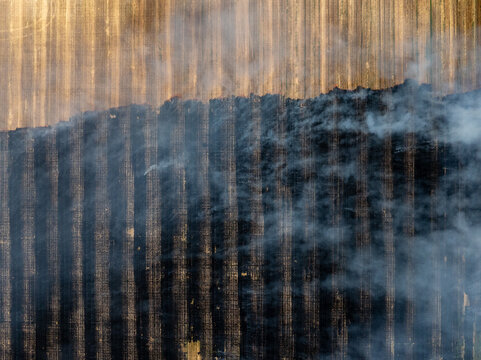 Abstract smoke pattern with golden backlighting