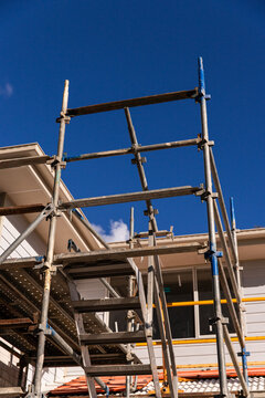 scaffold and temporary stairs at the site of a new house under construction