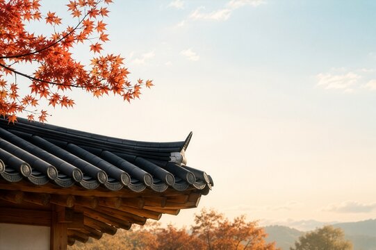 Traditional Korean hanok roof with autumn maple leaves and copy space