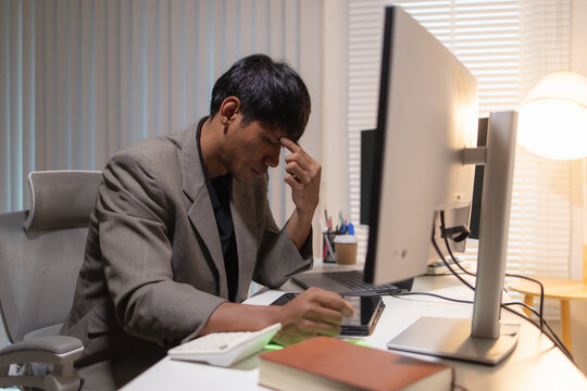 Professional financial analyst reviewing stock market charts across multiple screens using a tablet, laptop and calculator to evaluate price movements, technical indicators, and investment strategies.