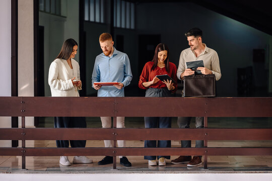 Business professionals collaborating and connecting with technology