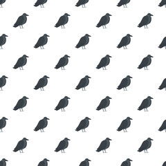 Naklejka premium Repeating black crow birds creating a continuous avian surface design for decoration