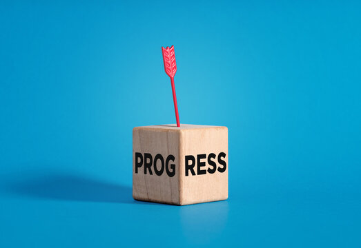 Red arrow hitting PROGRESS wood block