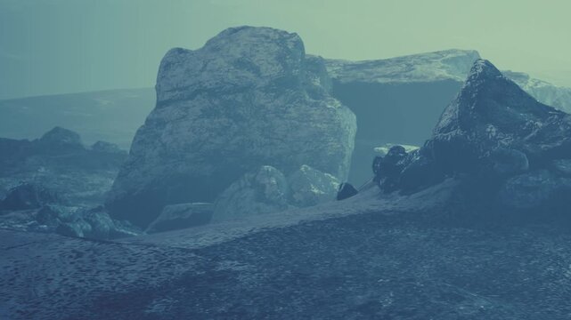 A rocky landscape is visible under a soft blue light. The scene shows large stones and hills with a slight mist. The area appears desolate and isolated without any people around.