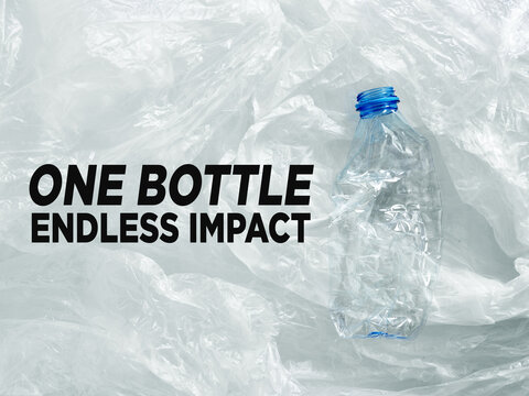 Crushed plastic bottle representing pollution and waste impact