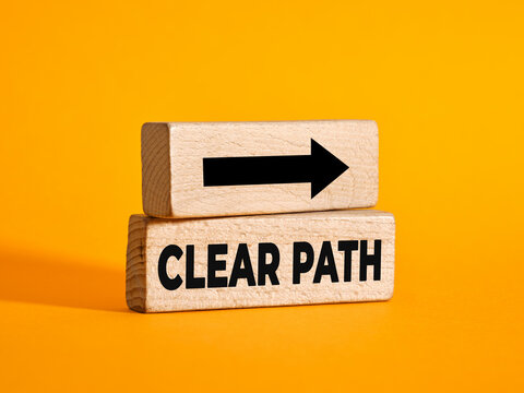 Clear path wooden blocks showing business direction