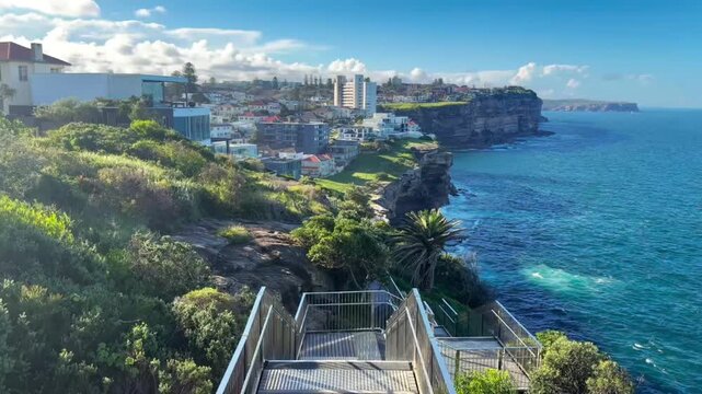 Metal Staircase on Coastal Cliff Walk Overlooking Bondi to Bronte Ocean Coastline and Residential Headland