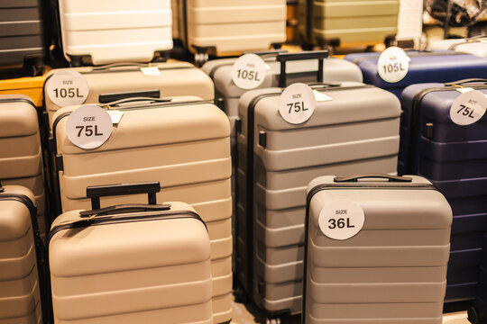 Hard Shell Suitcases in Assorted Sizes on Retail Display