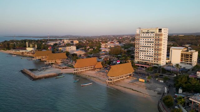 Aerial view of Kelapa Lima Beach coastline and city buildings in Kupang, East Nusa Tenggara, Indonesia,