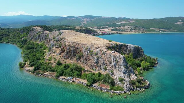 Quiet Lin village peninsula with emerald water rocky shore old roman mosaic and delicious food