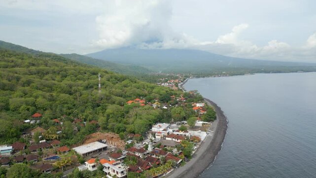 Mount Agung Surrounded By Cloud Amed Beach Bali Indonesia Drone Track In 4K 60FPS