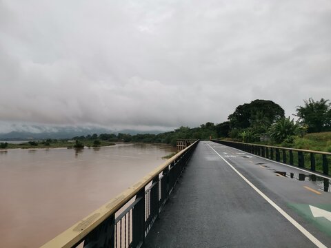 river view with bridge on dim sky background