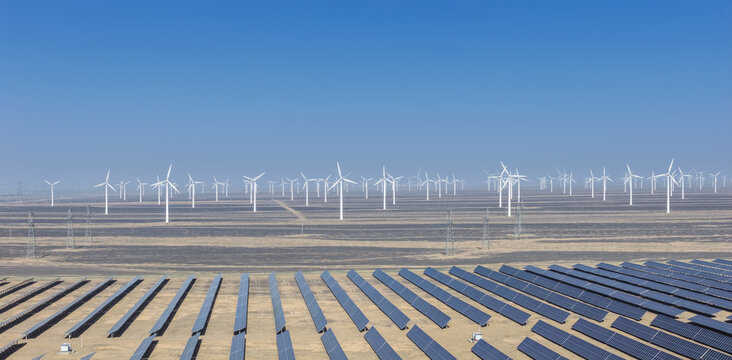 Hybrid Solar And Wind Power Plant In Arid Desert Landscape