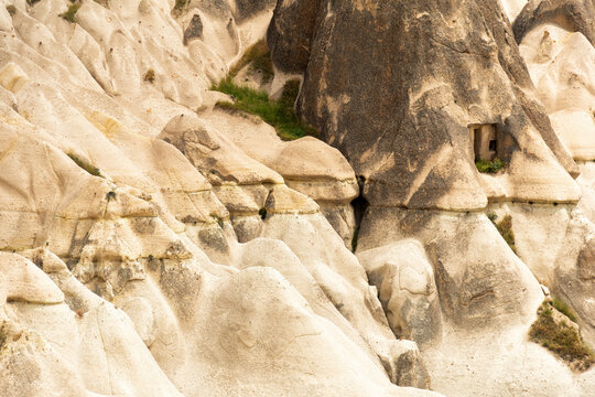 Ancient rock-cut cave dwelling in the unique volcanic landscape