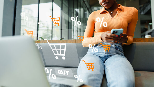 Online shopping on a smartphone while sitting in a cafe during the day