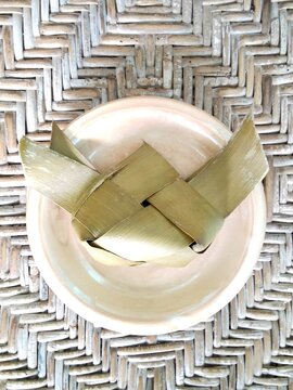 Traditional Indonesian lemper snack made of sticky rice filled with shredded chicken.