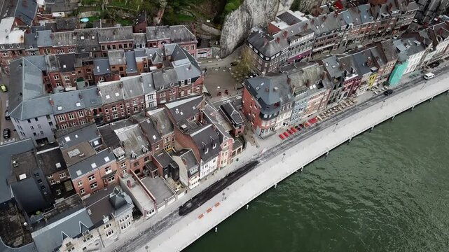 Aerial view of dinant, belgium cityscape with river meuse and notre dame de dinant cathedral.