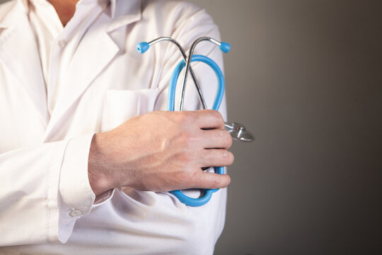 Doctor holding a stethoscope in his hands. Medical concept.
