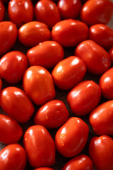 Naklejka premium Fresh red tomatoes as background
