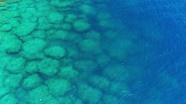 Aerial view of blue and turquoise sea