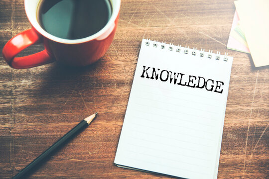 KNOWLEDGE word on white paper